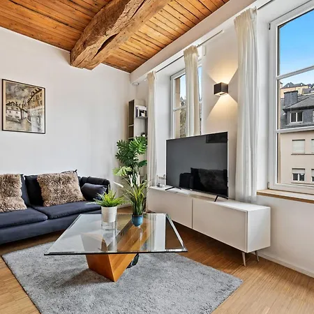 Stylish In Grund With Balcony & Views